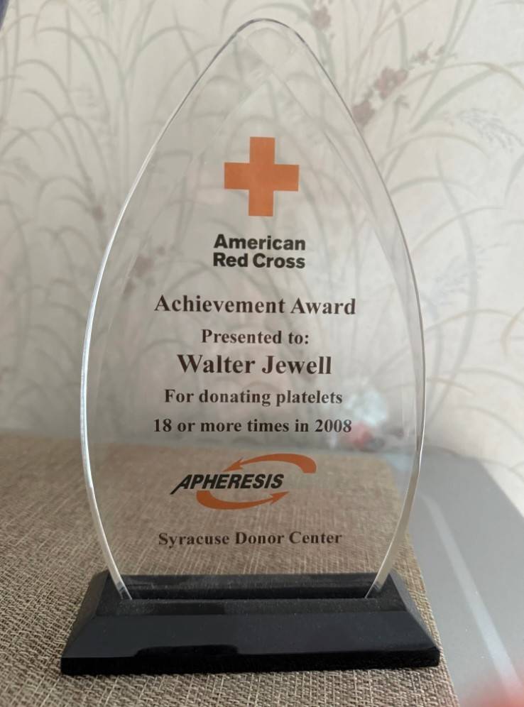 Elaine Reilley's father's Apheresis Achievement Award.