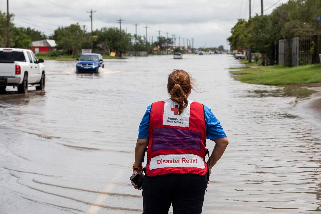 July 28, 2020. Edcouch, Texas
Juanita Casanova of the American Red Cross surveys flooding caused by Hurricane Hanna, on the outskirts of Edcouch, TX on Tuesday July 28, 2020.
Photo by Scott Dalton/American Red Cross