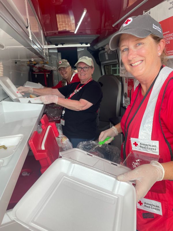 volunteers at scenes of hurricane damage