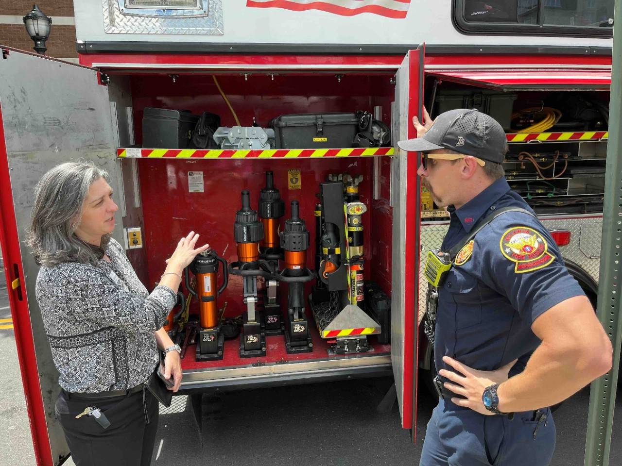 CEO Alicia Doherty talks to Atlanta firefighter Troy Crouch