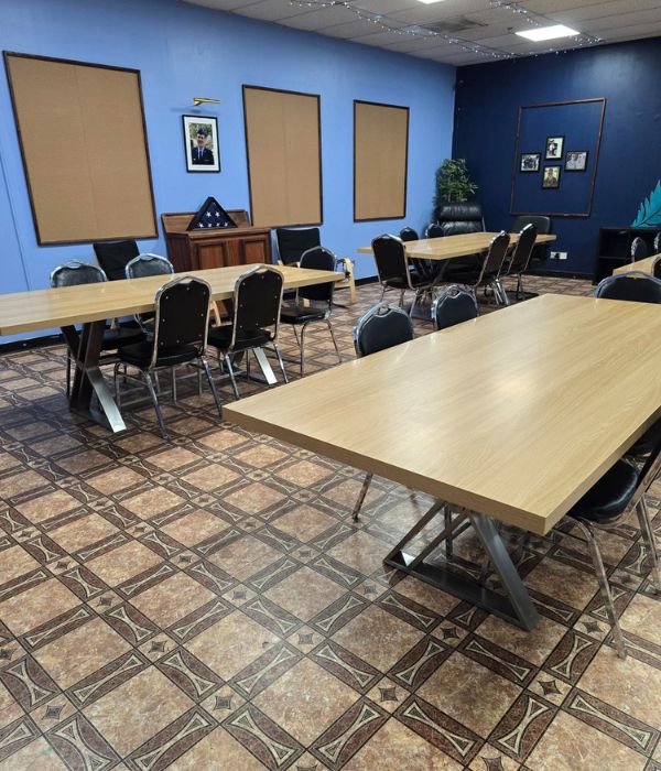 room with blue walls and patterned floor.