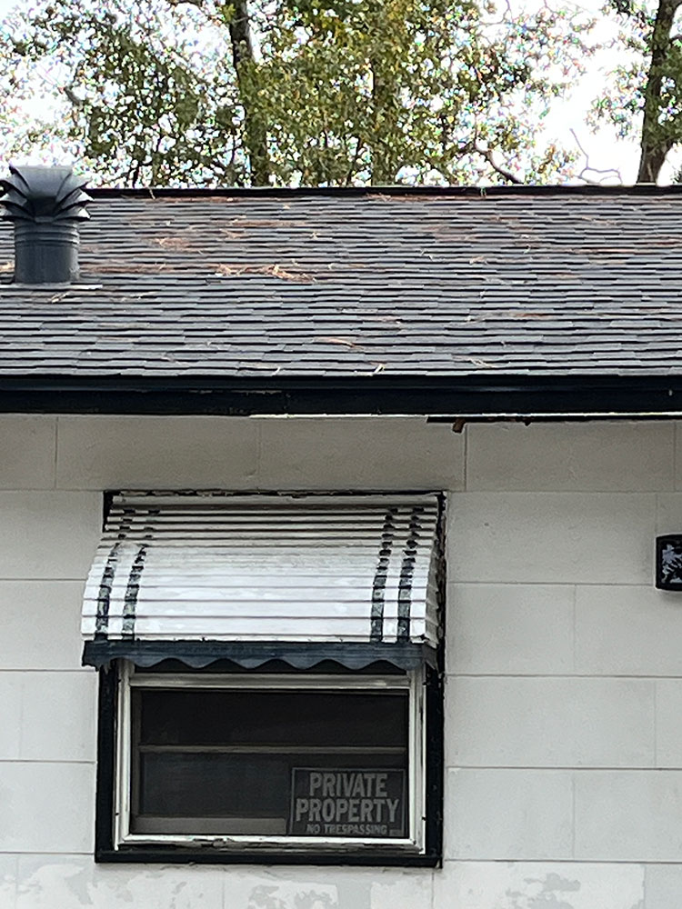 a window with an awning on Dontarius Dye's house.