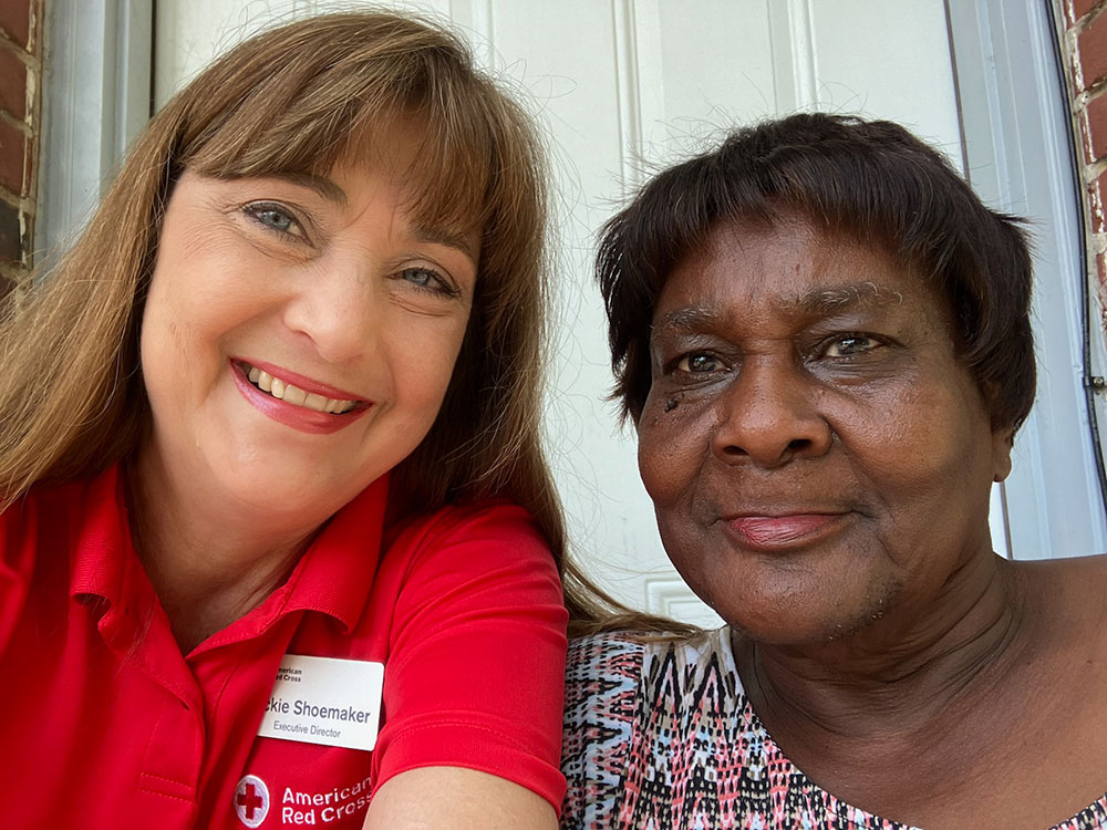 Jackie Shoemaker and Ms. Morris Gosier smiling for camera.