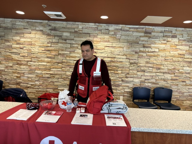 jaime in disaster relief uniform at red cross booth