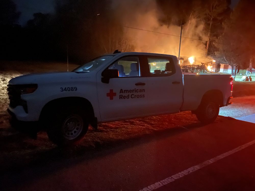 red cross truck outside of house fire