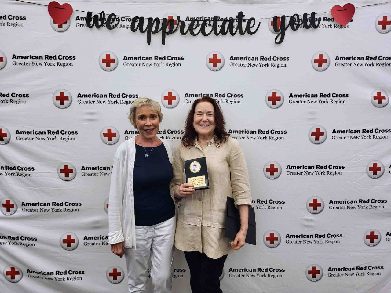 Sally Nielsen poses with award winner Madelyn Miller