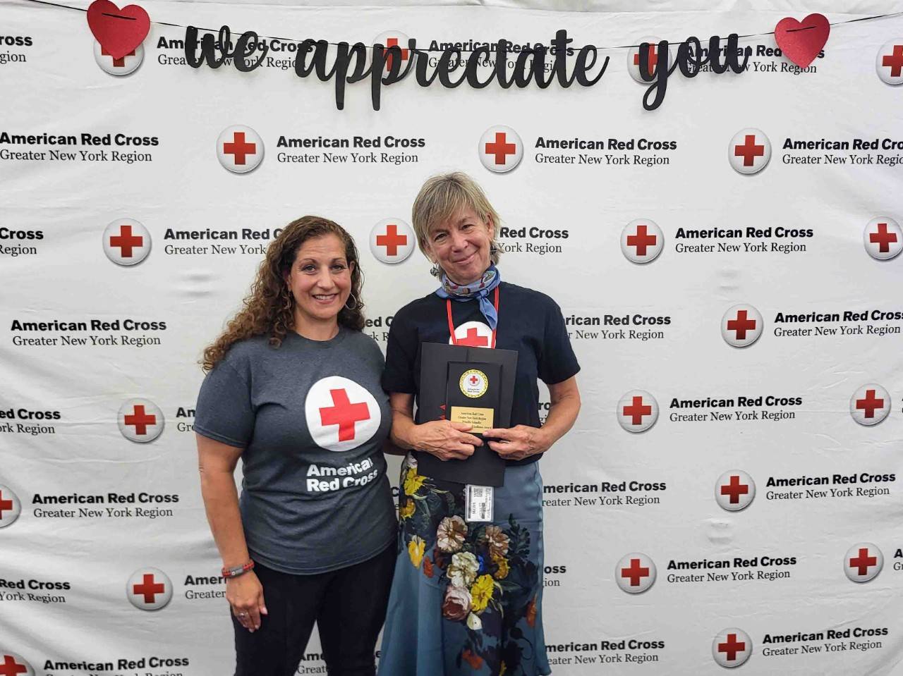 Andrea Grimaldi-Grafer poses with award winner Priscilla Schaefer 