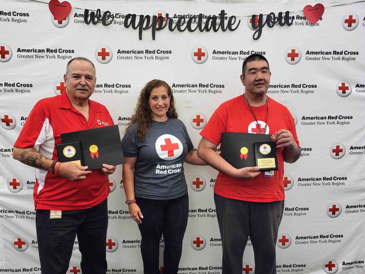 Andrea Grimaldi-Grafer poses with award winners Anthony Incorvaia and Howard Moi