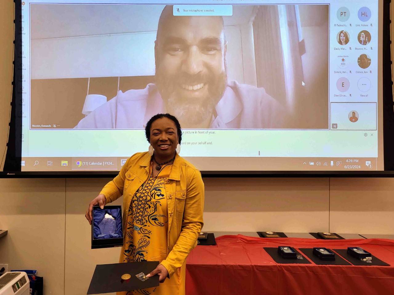 Uikki O’Bryant poses with award winner Fernando Morales 