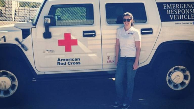 erin philips in front of emergency response vehicle