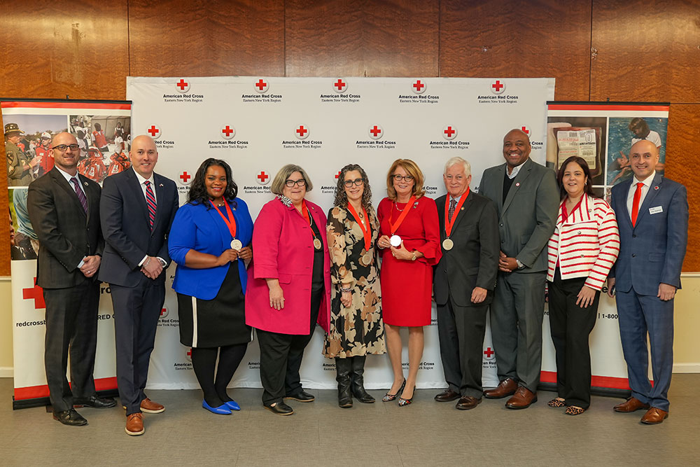 Group pic of the six New York State legislators and Red Cross staff at a Red Cross event.