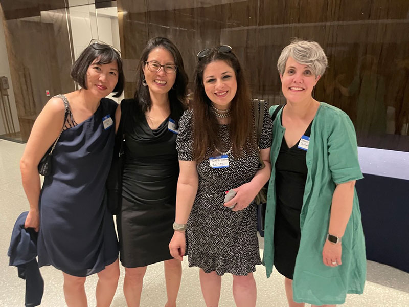 4 women at event smiling for the camera