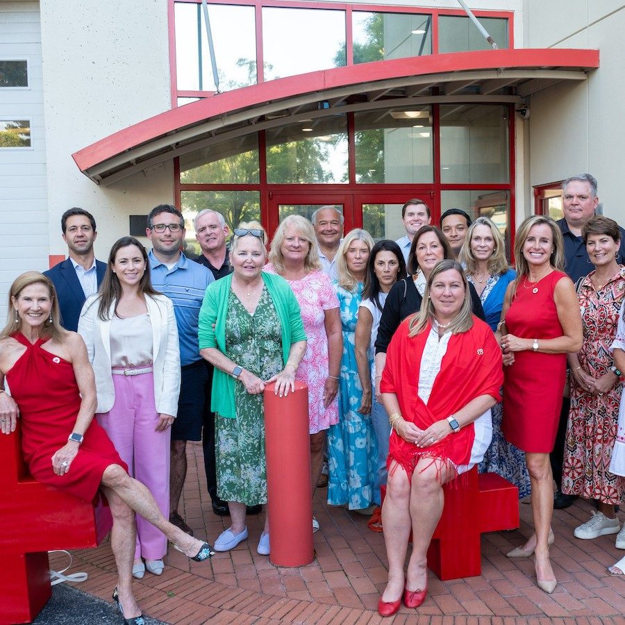 Red Cross board members, staff and volunteers in front of the state-of-the-art Jill and John Coyle Blood Donor Center