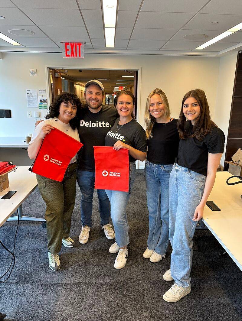 Erin Moldovan and red cross staff.