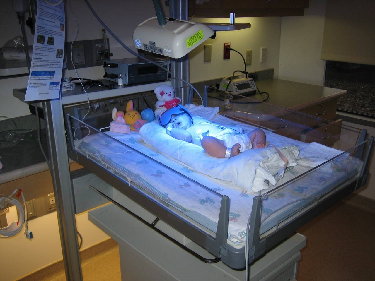 A baby in a hospital nursery