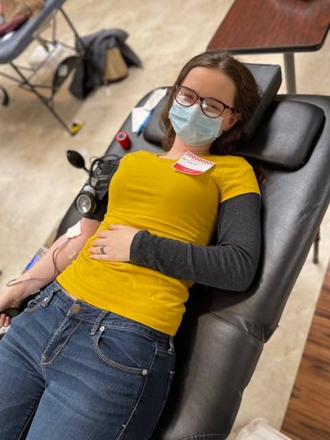 Volunteer Rhiannon Costanzo donates blood