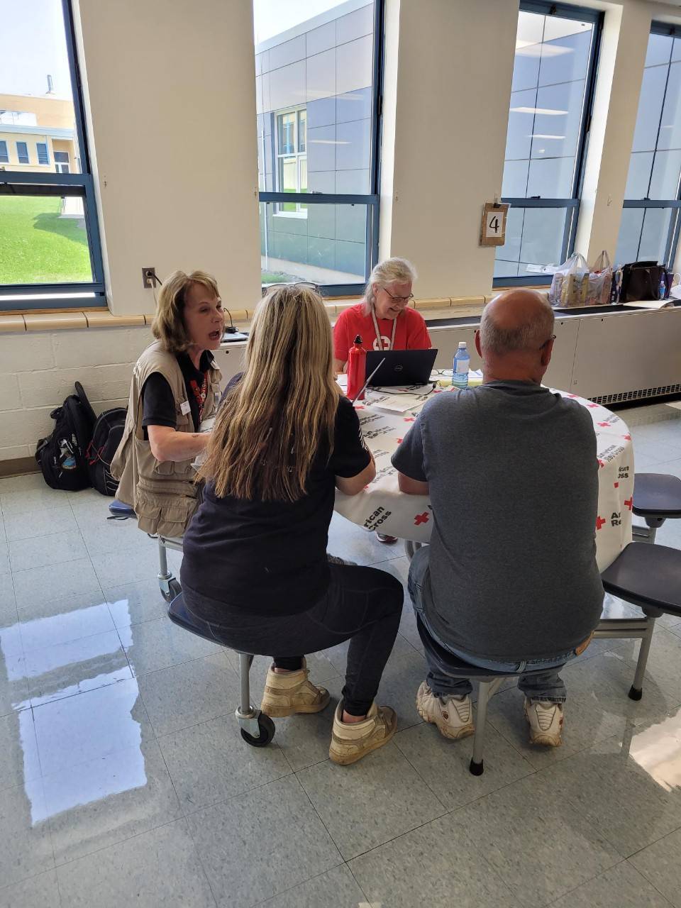 Volunteers work at a table