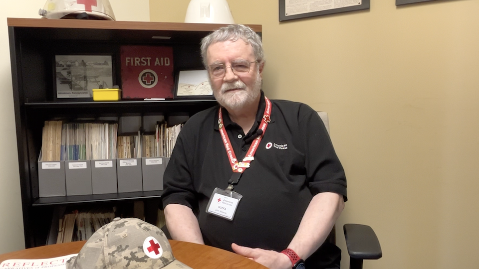 John Weaver wearing a black polo shirt with an American Red Cross logo
