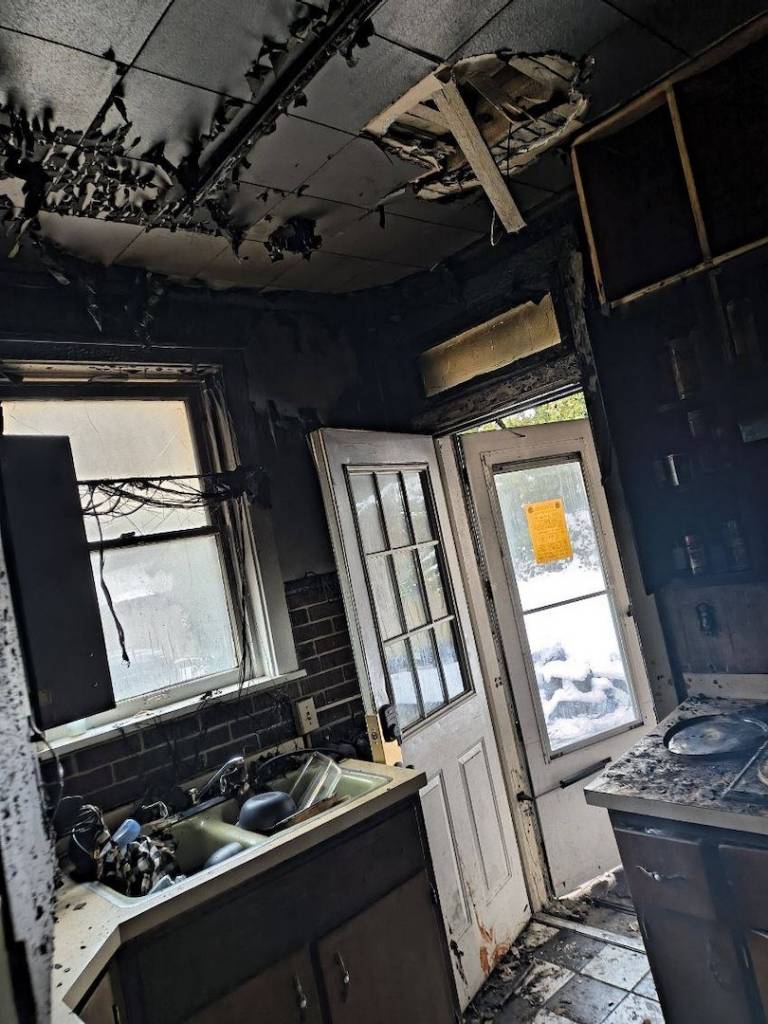 Image of charred kitchen after home fire