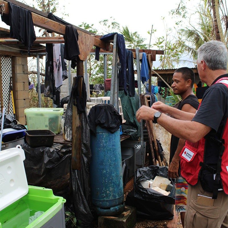 Archurine Mateak and Red Cross volunteer.