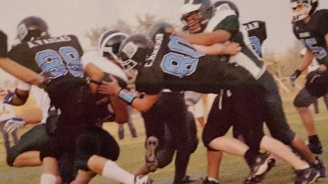 Colton playing football