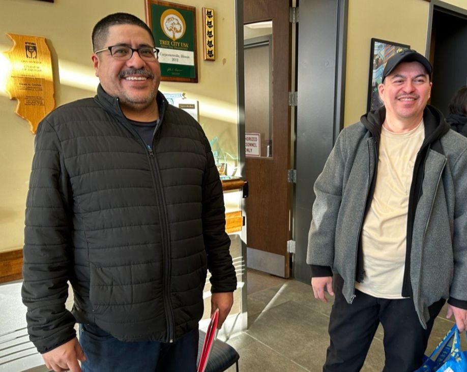 luis and wilfredo smiling