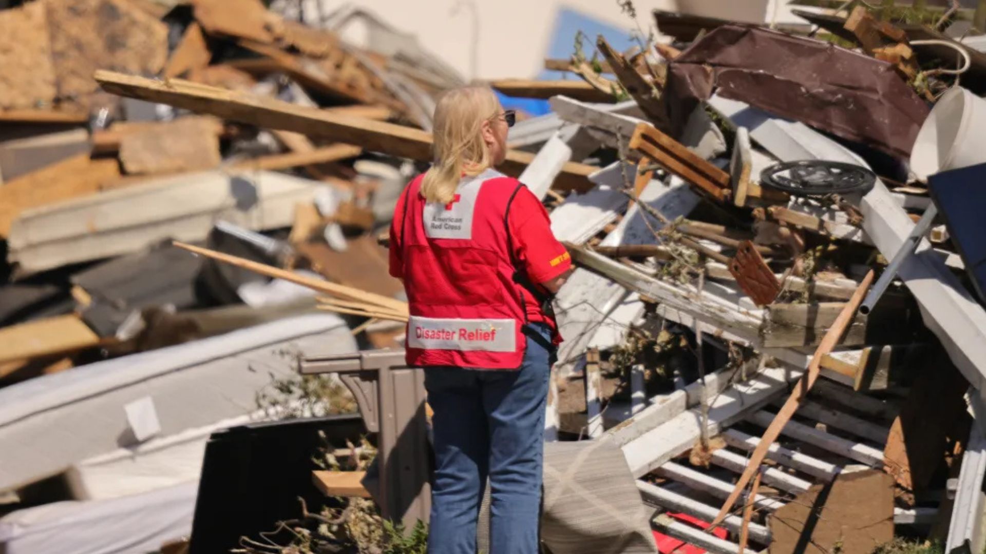disaster volunteer viewing damage from storm