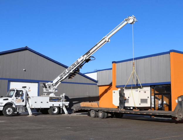 Generator Lifted from Truck