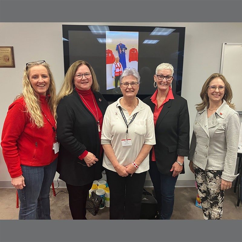 Gail Miller with Red Cross staff group photo.