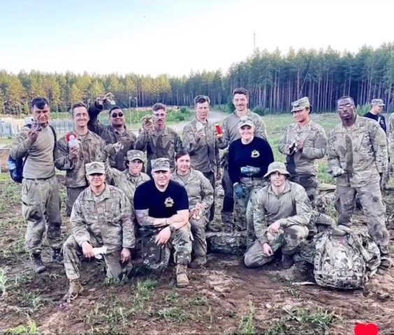 Red Cross SAF Regional Program Manager Amanda English poses with her “Spur Ride Squad” at the start of the competition.