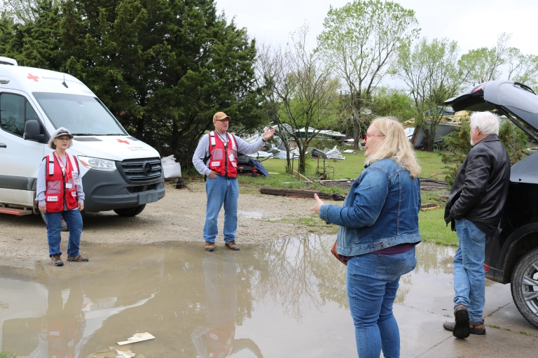Lori and Patrick Loney talking to a group