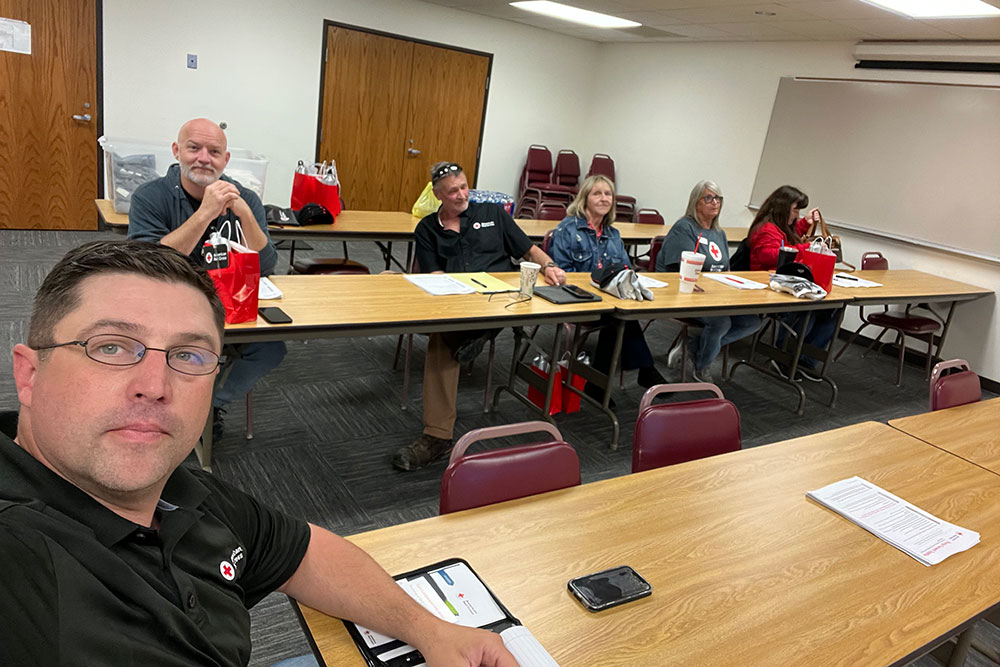 Community Disaster Program Manager Kyle Lewis takes a selfie with his group of Greater Kansas Chapter volunteers.