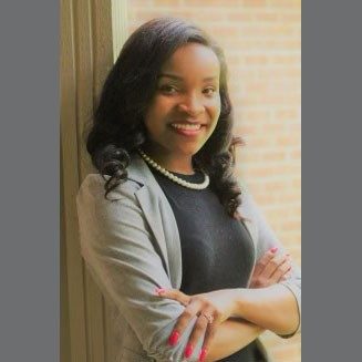 Mikayla Lomax smiling for camera.
