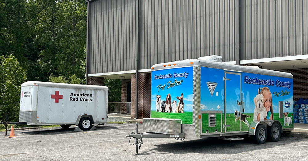 American Red Cross and Rockcastle County Pet Shelter trailers in a parking lot.