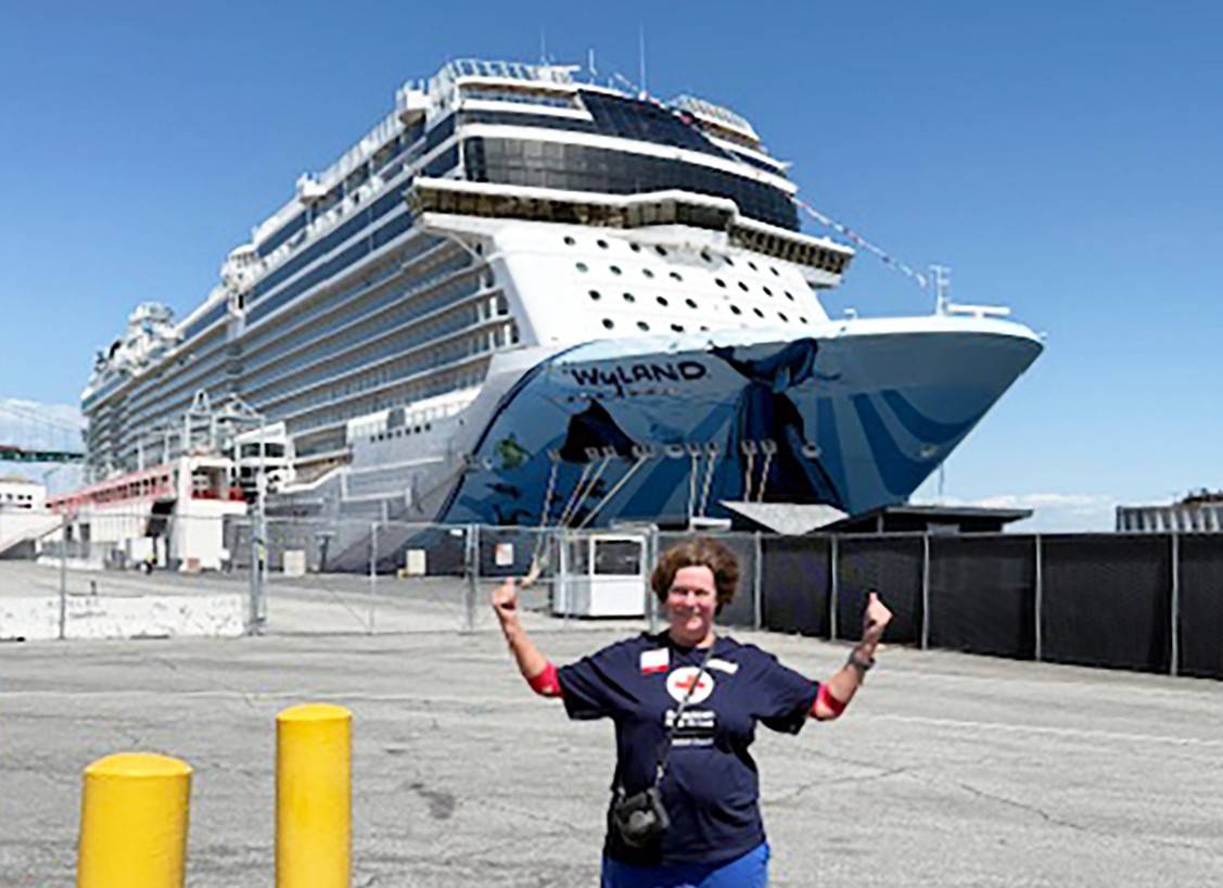 Diana Baker in front of a cruise ship where she donated blood.