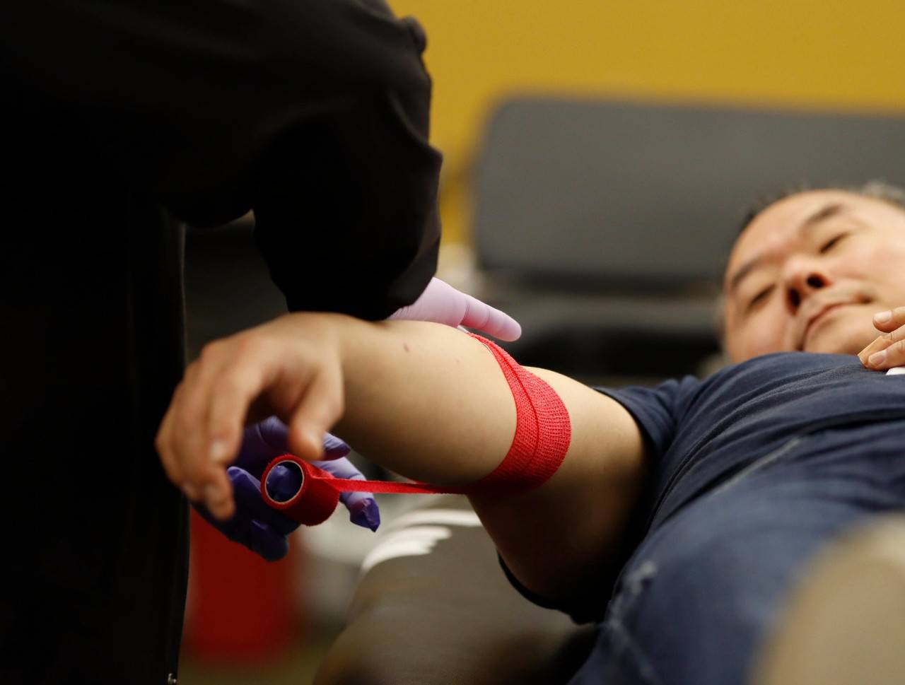 Councilmember John Lee’s arm is bandaged after completing a blood donation at an American Red Cross blood drive at the Los Angeles Fire Department Station 87 on Saturday, Feb. 11, 2023. Photo by Raquel G. Frohlich/American Red Cross.