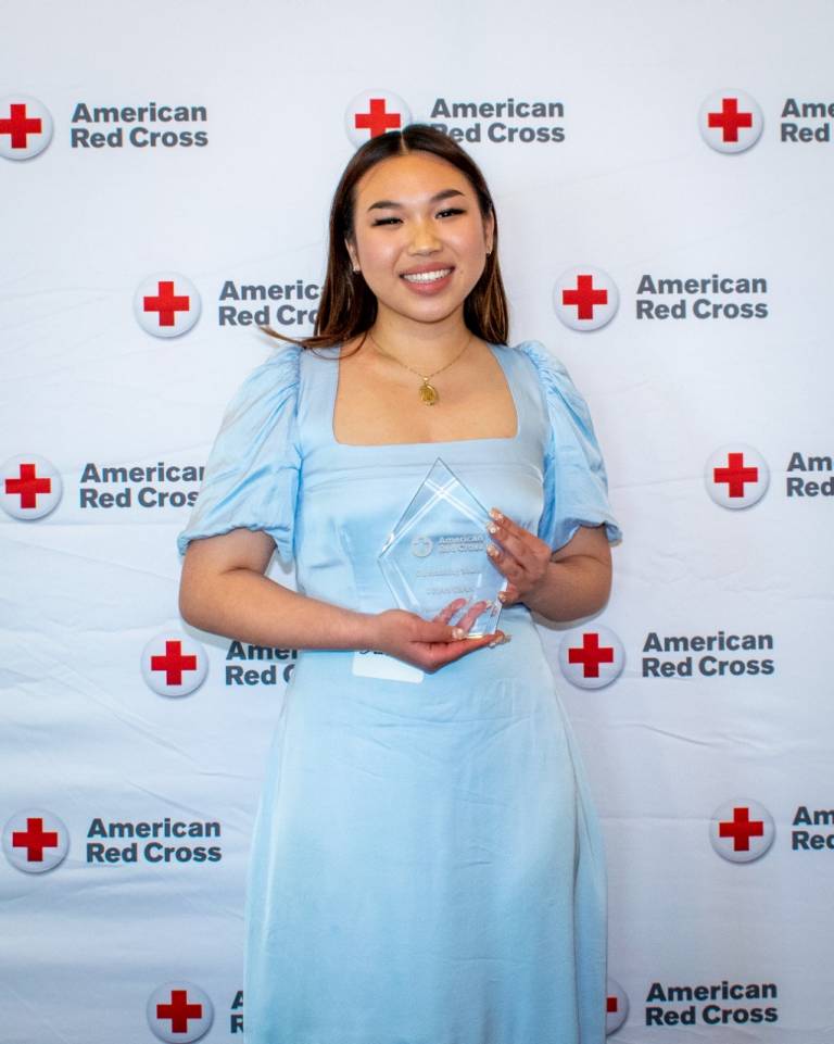 Dzian Tran receives the Outstanding Youth Award