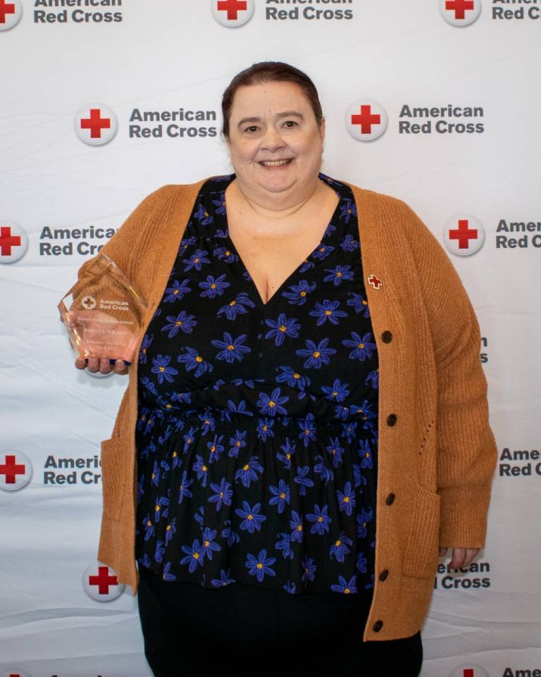 Pamela Wilson receives the Biomedical Achievement Award