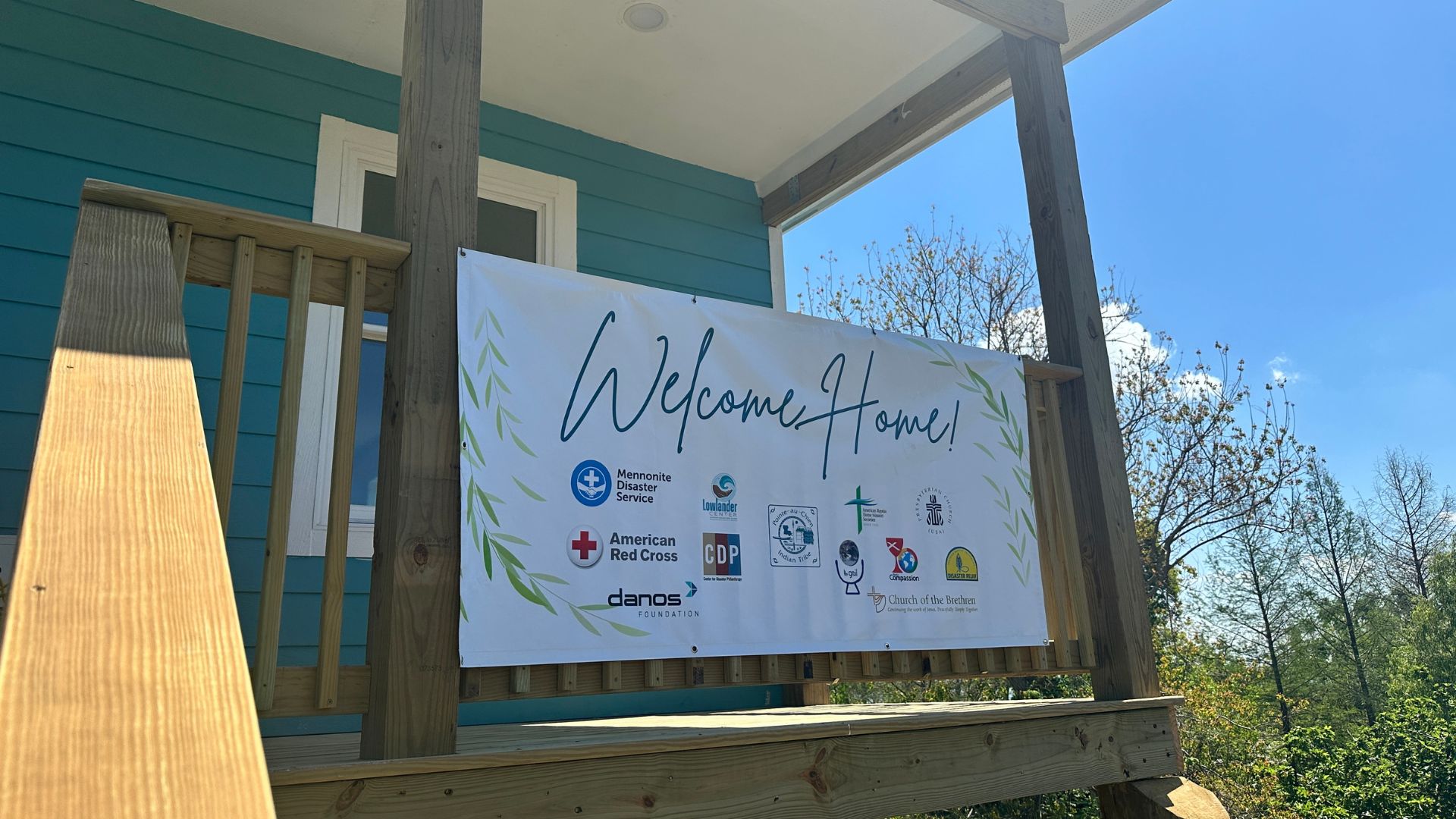 welcome home signage on building