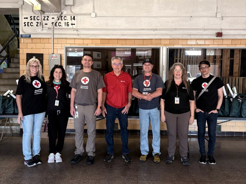 red cross team members outside of exhibit