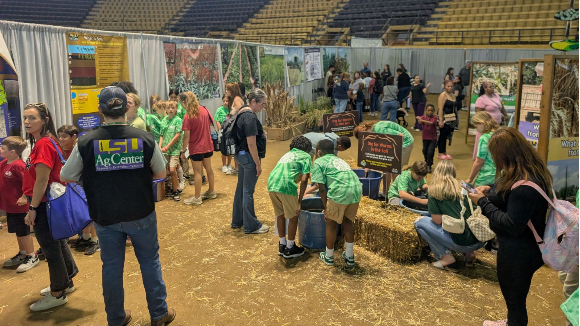 groups of children playing in agriculture exhibit