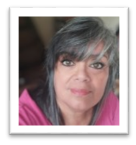 CARMEN ROBLES​ headshot.