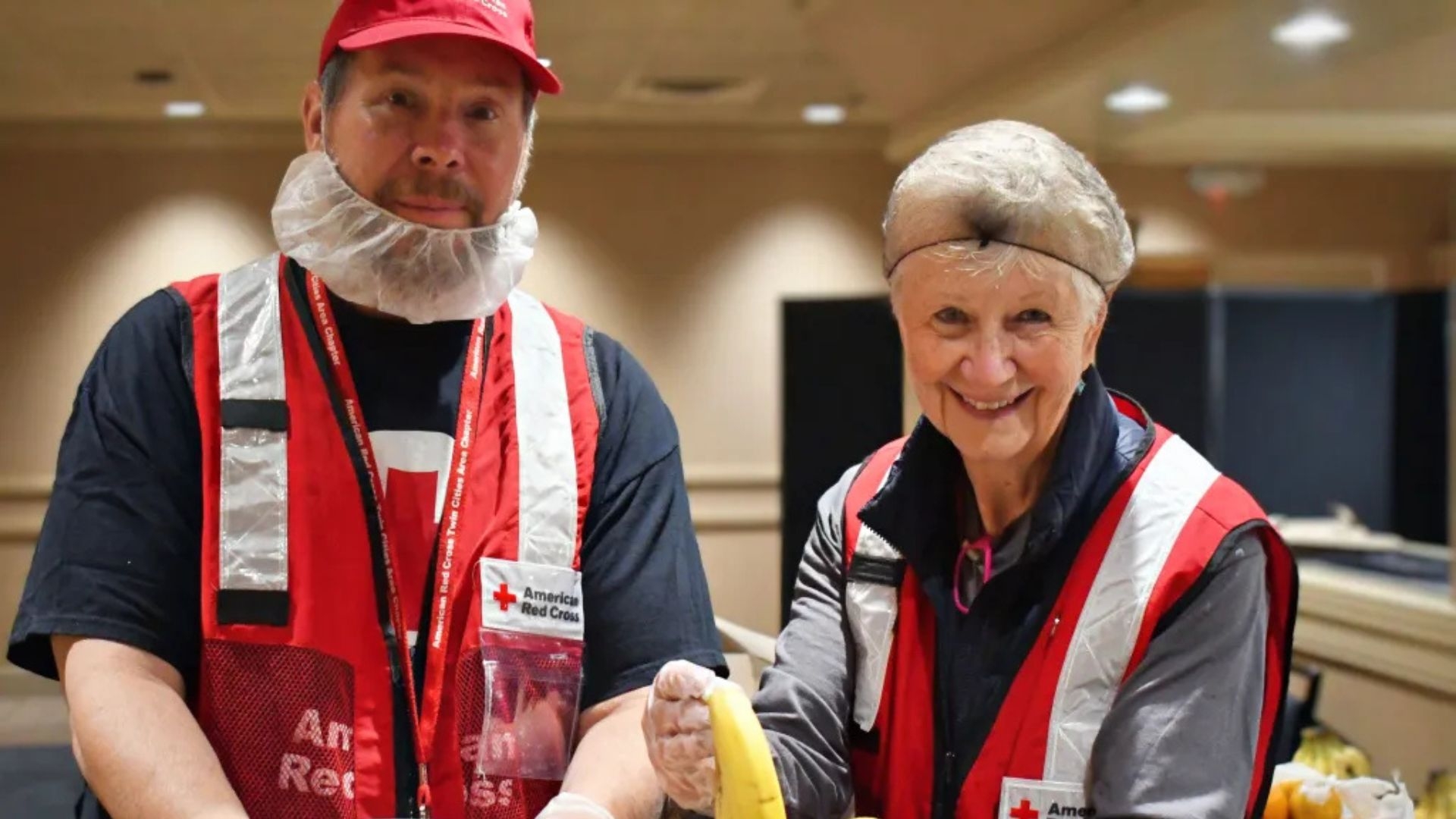 volunteers handling food