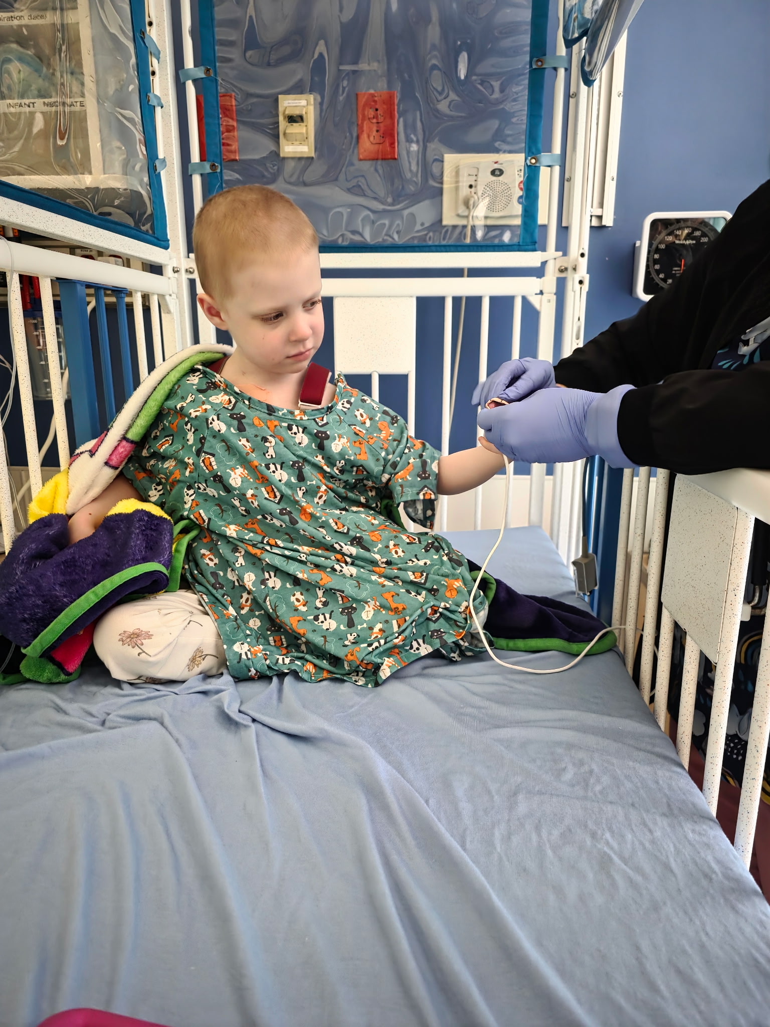 young girl in hospital bed