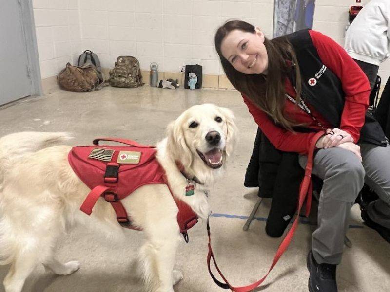 jill eaves smiling with dog