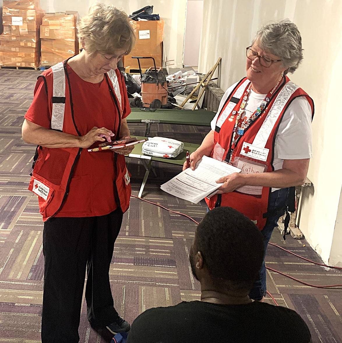 Volunteers Vicki Sharp and Kathie Hoette