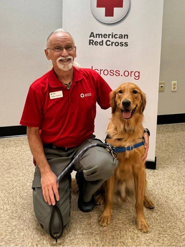 walter roberts smiling with dog
