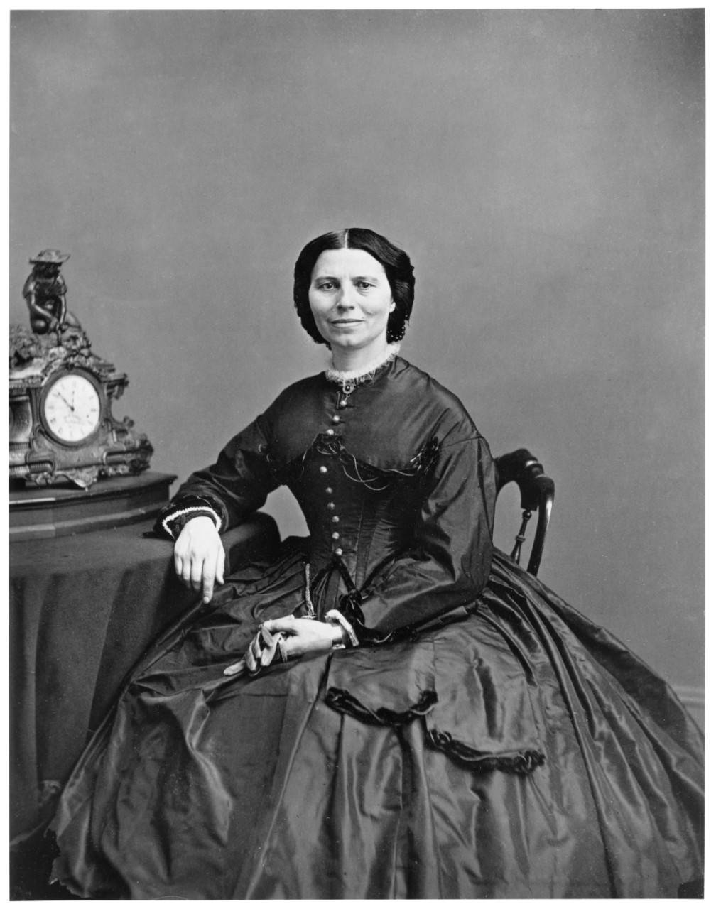 Black and white portrait photograph of Clara Barton, circa 1865