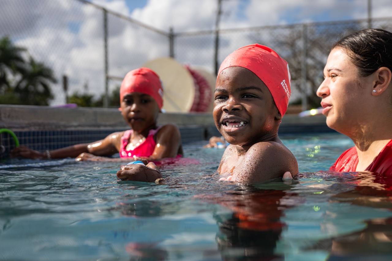 May 4, 2024. Miami, Florida.This photograph illustrates a Water Safety Instructor® teaching swimming and water safety skills that are part of an American Red Cross Learn-to-Swim class delivered by a Red Cross training provider.Fiorenza Bagala is a Water Safety Instructor® and lifeguard and enjoys sharing her love of swimming with children at the Palm Springs North Pool in Miami, Florida. She emphasized the importance of this training:  We're literally surrounded by water wherever we are. It's super important to teach them that especially at a young age. I believe that the younger you are, the better it is because you have the rest of your lifetime to just keep practicing. Photo illustration by The American National Red CrossPlease note: these are staged photos and shouldn t be conveyed as a real event.