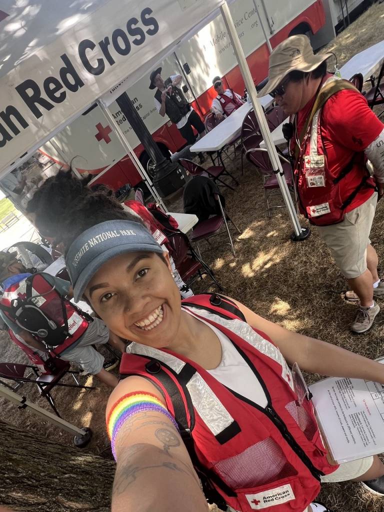 Radiance Campbell taking a selfie at a Red Cross event